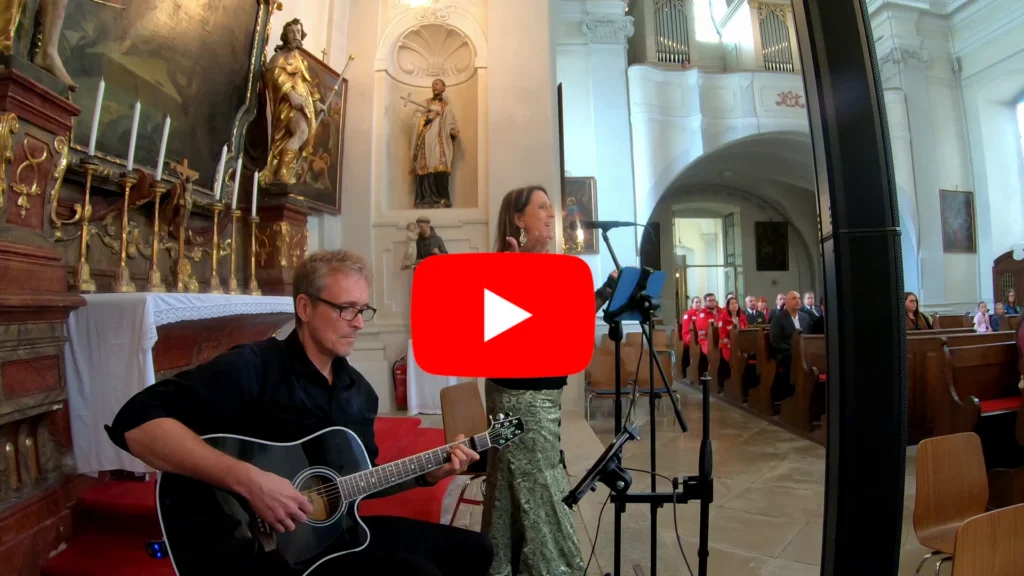 Link zu einem Youtube Video mit dem Bild einer Trauung in der Kirche